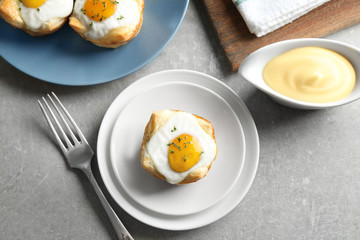 Tasty baked egg in dough on plate