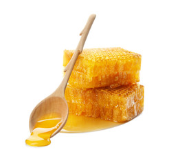 Fresh honeycombs with spoon on white background