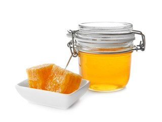 Composition with sweet fresh honey on white background