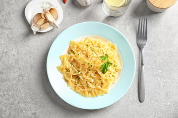 Delicious pasta with garlic and parsley on plate
