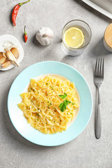 Delicious pasta with garlic and parsley on plate