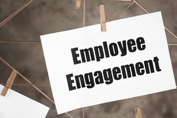 Sheet of paper with text EMPLOYEE ENGAGEMENT, closeup