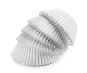 Forms for baking cupcakes on white background