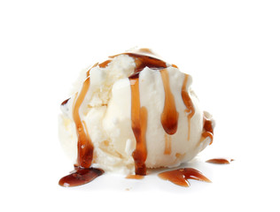 Ice cream ball with caramel sauce on white background