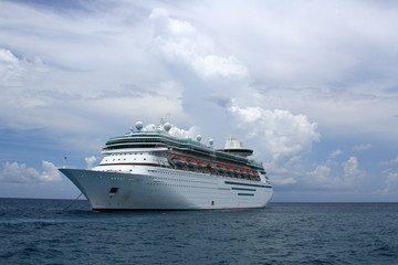Fototapeta na wymiar Cruise Ship Anchored at Sea