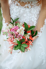 bride with wedding bouquet. Morning at wedding day at summer