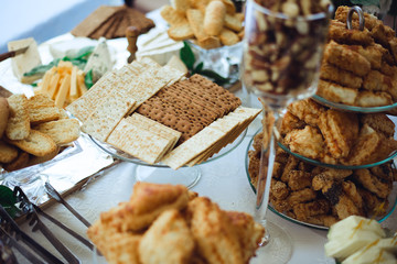 Delicious and tasty dessert table with biscuits and sweet pastries 