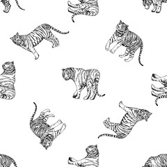 Seamless pattern of hand drawn sketch style tigers. Vector illustration isolated on white background.