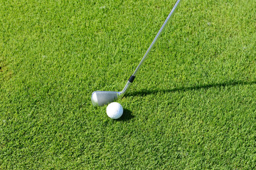 Play golf on the grass, close-up