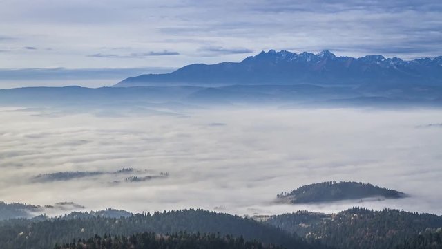 Flowing clouds at sunrise in the Tatra mountains, Poland, Timelapse