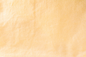 texture of a yellow cotton fiber surface forming a fabric, abstract background