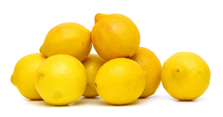 Yellow ripe lemons isolated on white background