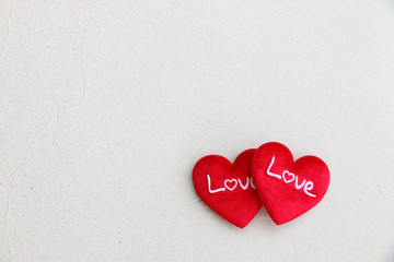 Fototapeta premium Red heart on the sand background Valentine day