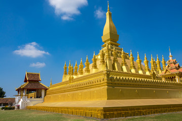 Naklejka premium Pha That Luang is a gold-covered large Buddhist stupa and be the most important national monument in Laos and a national symbol .Vientiane, Laos