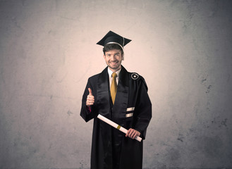 Portrait of a young graduate student on grungy background