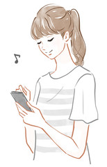 スマートフォンを操作する女性