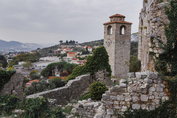 Fototapeta na wymiar Vintage clock tower of Old Town Bar in Montenegro
