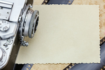 retro camera, negative films and old photos macro view. old memories in vintage style.