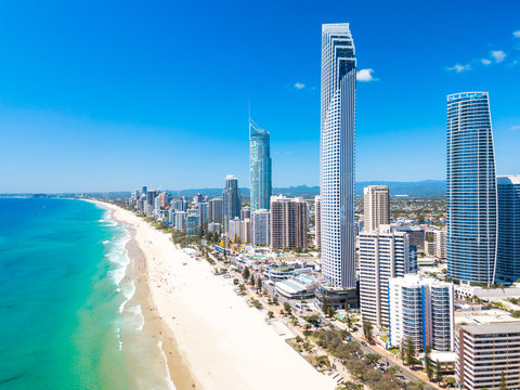Surfers Paradise aerial view on a clear day on the Gold Coast with blue water - Powered by Adobe