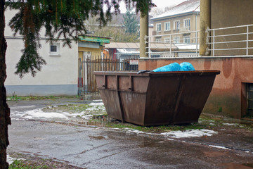 Fototapeta na wymiar Metal waste container