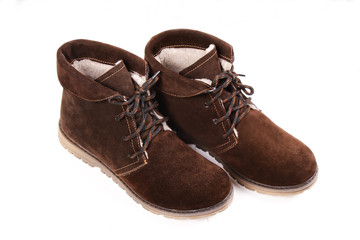 Women's winter boots, brown, suede, shoes isolated white background.