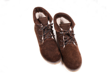 Women's winter boots, brown, suede, shoes isolated white background.