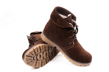 Women's winter boots, brown, suede, shoes isolated white background.