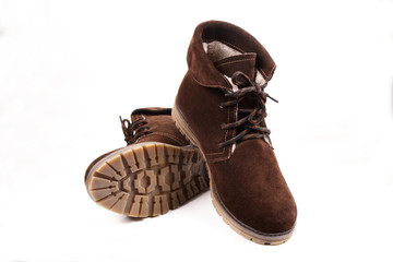 Women's winter boots, brown, suede, shoes isolated white background.