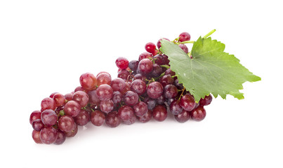 Red grape with leaf isolated on white background