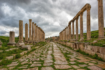 A  collonade street in the ancient city of Gerasa after a storm