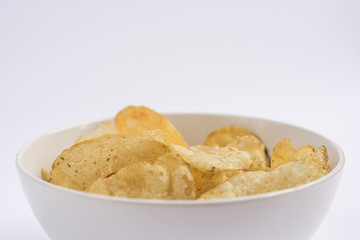 Simple potato chips on white background
