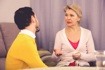 Mature mother and son quarrel