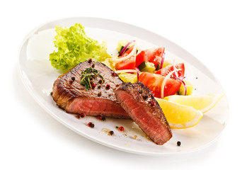 Grilled steaks and vegetables
