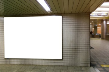 blank advertising billboard or big light box showcase on wall at airport or subway train station, copy space for your text message or media content, commercial and marketing concept