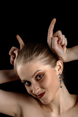 Fototapeta premium woman show horns