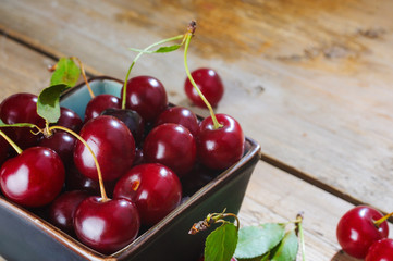 Fresh ripe sweet cherry in the bowl.
