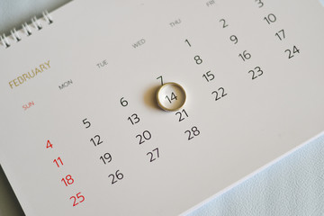 Close up ring marking on white calendar.