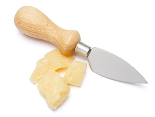 pieces of Parmesan cheese and knife on white background