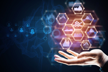 Hand holding business hologram