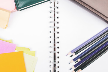 Creative desk with empty notepad