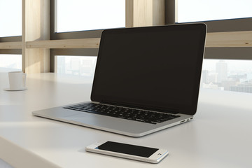 Fototapeta premium Empty laptop and smartphone