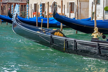 Boats gondolas at the pier in Venice, Italy