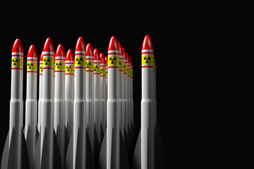 Combat rockets with the symbols of the atomic weapon displayed in a row. 3d illustration