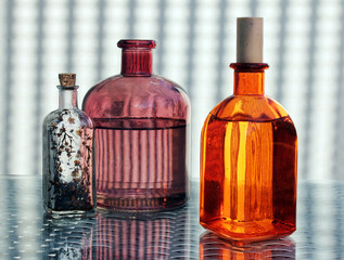 Three Vintage Glass Bottles