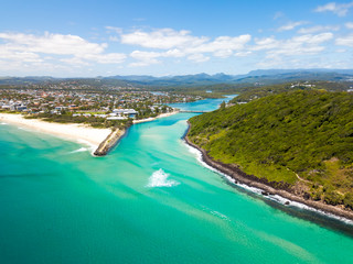 Tallebudgera creek and Burleigh Heads on the Gold Coast from an aerial perspective on a clear blue water day