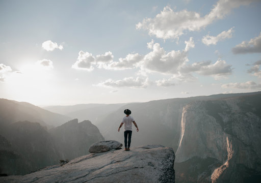 Young businessman looking at a view at Yosemite National Park - Powered by Adobe
