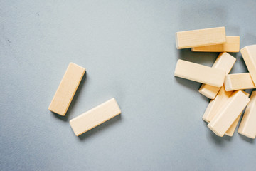 a lot of small wooden blocks scattered on the table