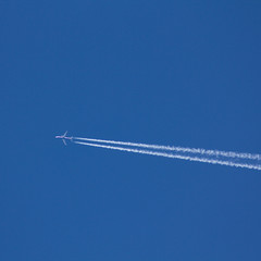 Jet traffic jet on a blue sky.
