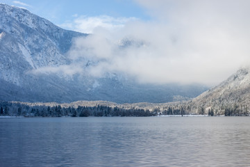 Mountains with snow over the lake