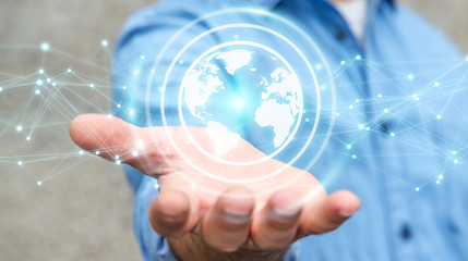 Businessman using planet earth network sphere 3D rendering